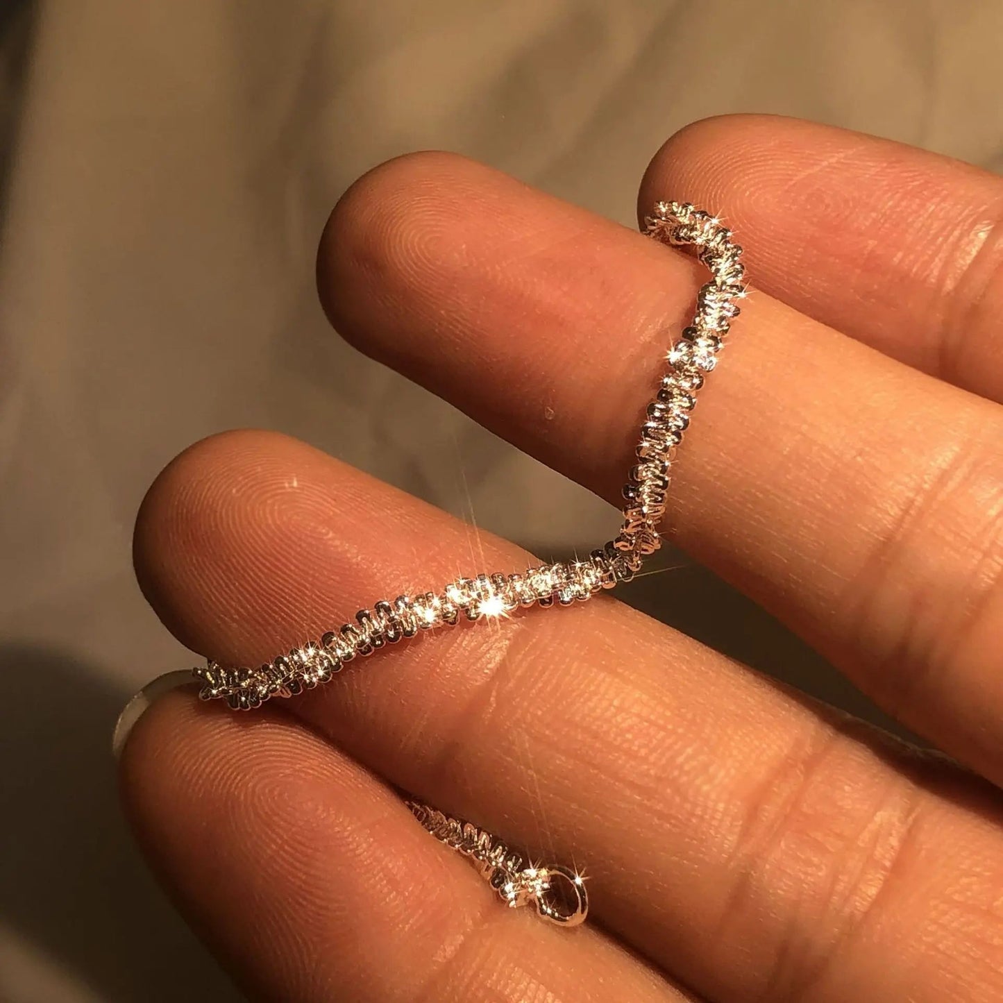 Glitrende Armbånd