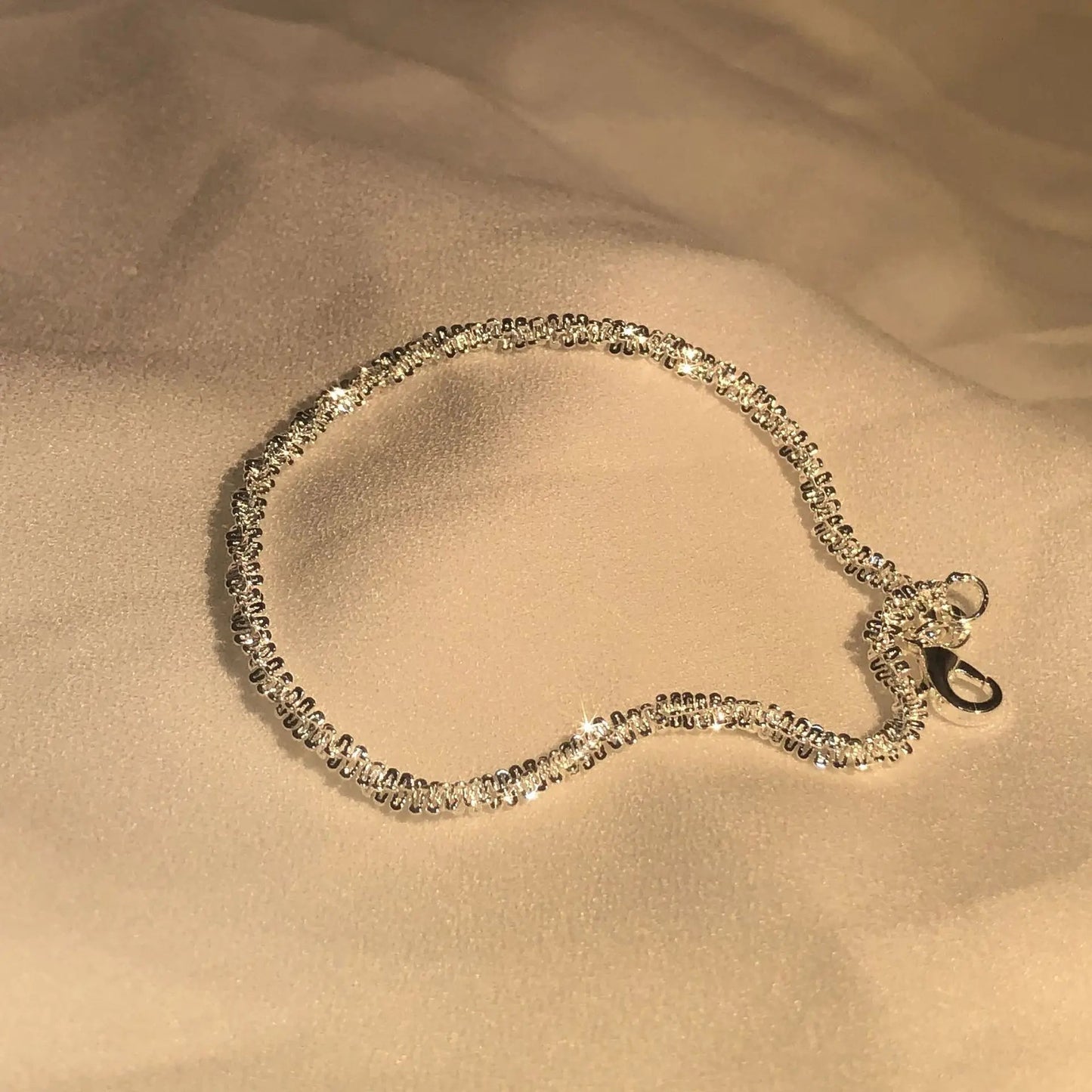 Glitrende Armbånd
