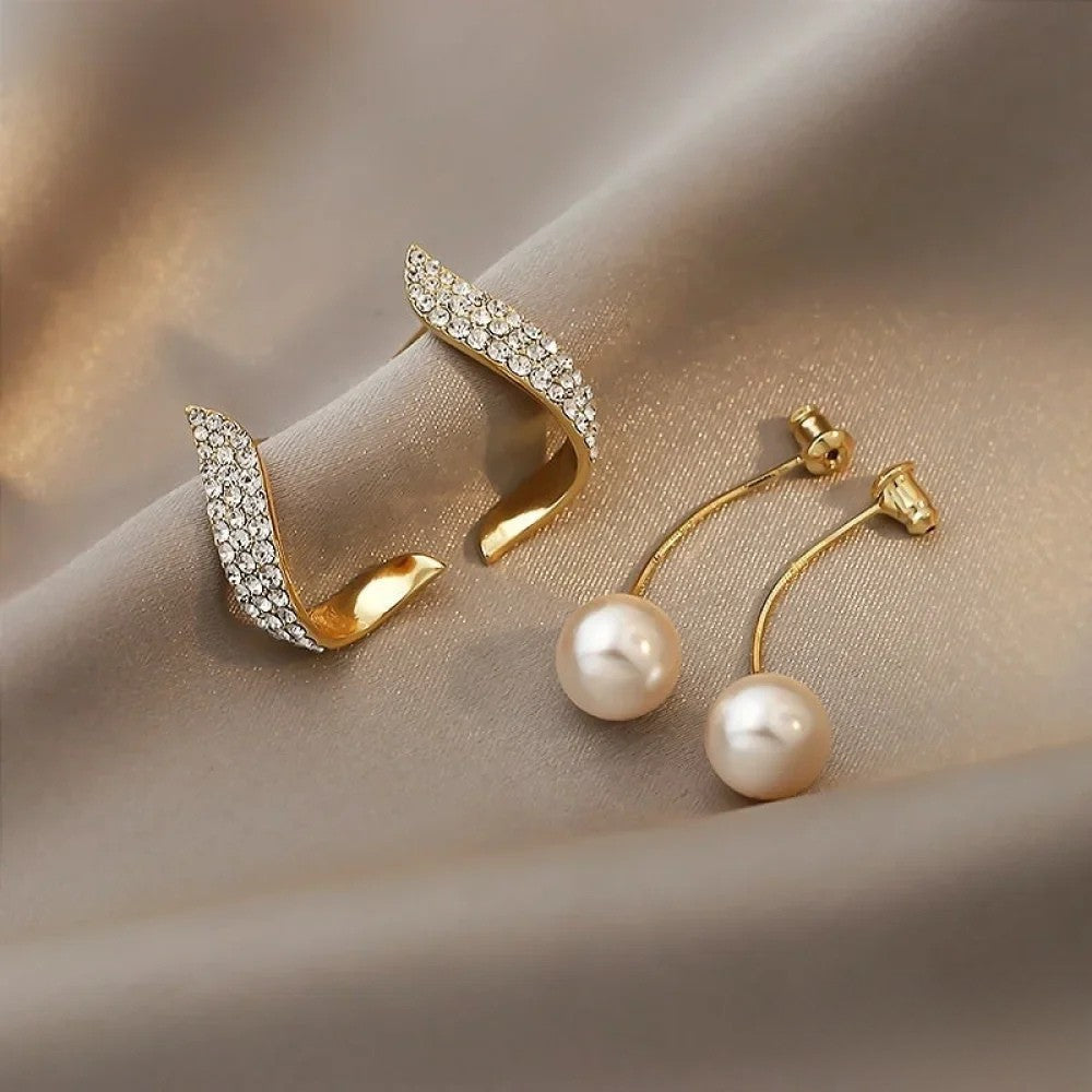 "Perlenohrringe" can be rewritten as "Perlen-Ohrstecker" or "Ohrhänger mit Perlen." If you're looking for something more descriptive, you could say "Elegante Perlenohrringe" or "Schicke Perlen-Ohrschmuck." Let me know if you need more options!