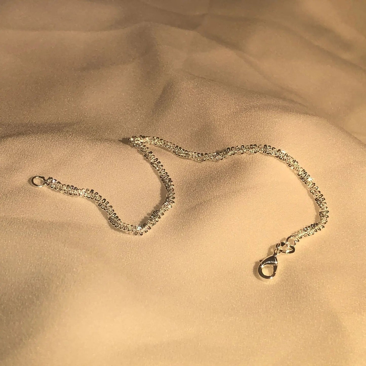 Glitrende Armbånd
