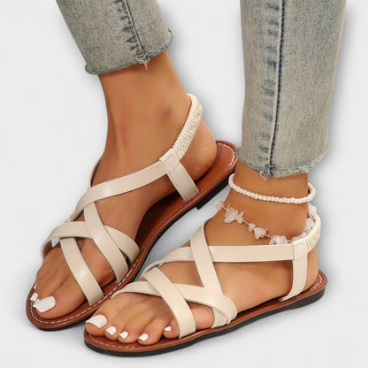 "Deborah - Dame Sandaler med Let Krydsrem" could be rewritten as "Deborah - Kvindelige Sandaler med Behagelig Krydsrem".