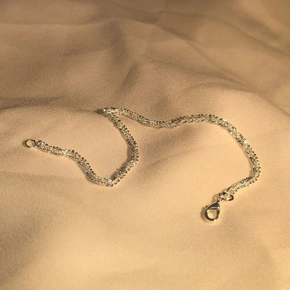 Glitrende Armbånd