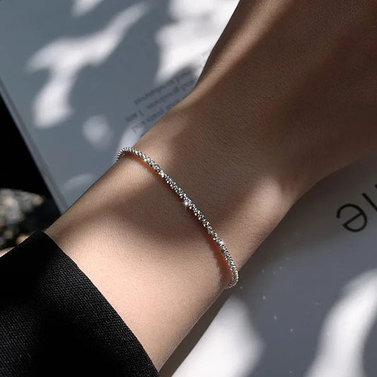 Glitrende Armbånd
