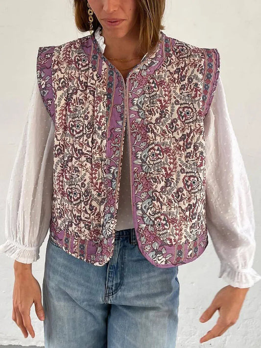 Freja | Blomsterprintet quiltet vest med åben front – ideel til et afslappet, retro look.