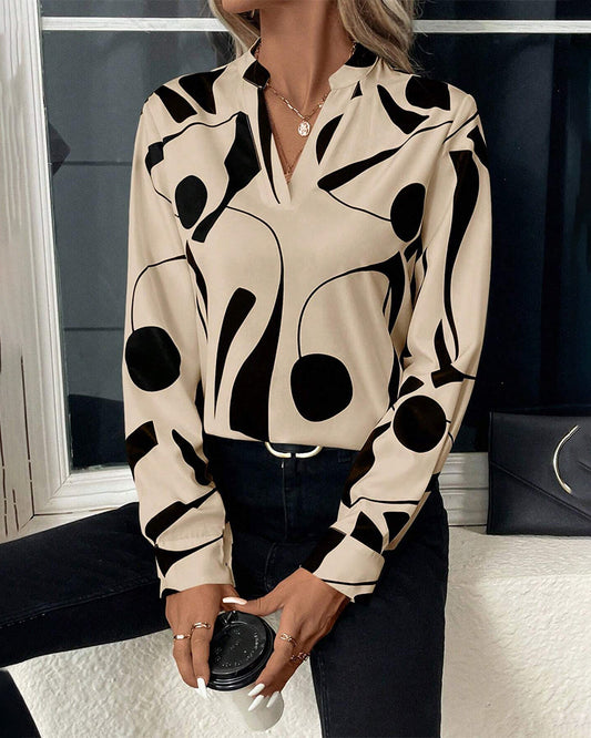 Rinan | Elegant og stilfuld bluse med luksuriøst design og lange ærmer