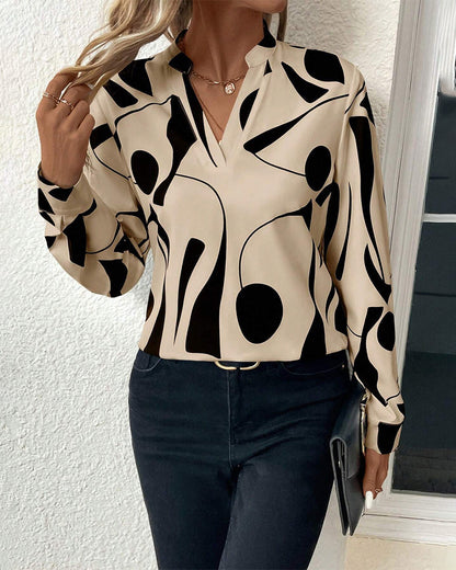 Rinan | Elegant og stilfuld bluse med luksuriøst design og lange ærmer