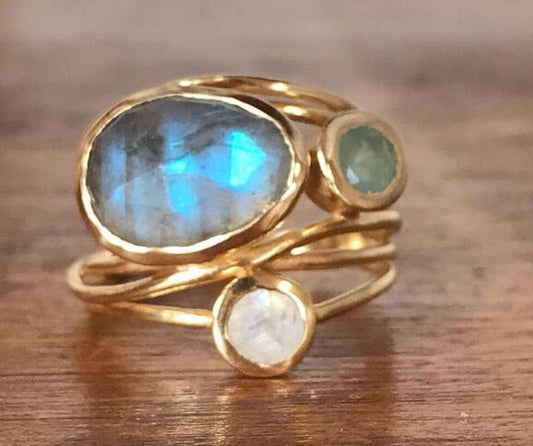 Vintage Indlagt Blå Månestensring" can be rewritten as "Vintage Inlaid Blue Moonstone Ring.